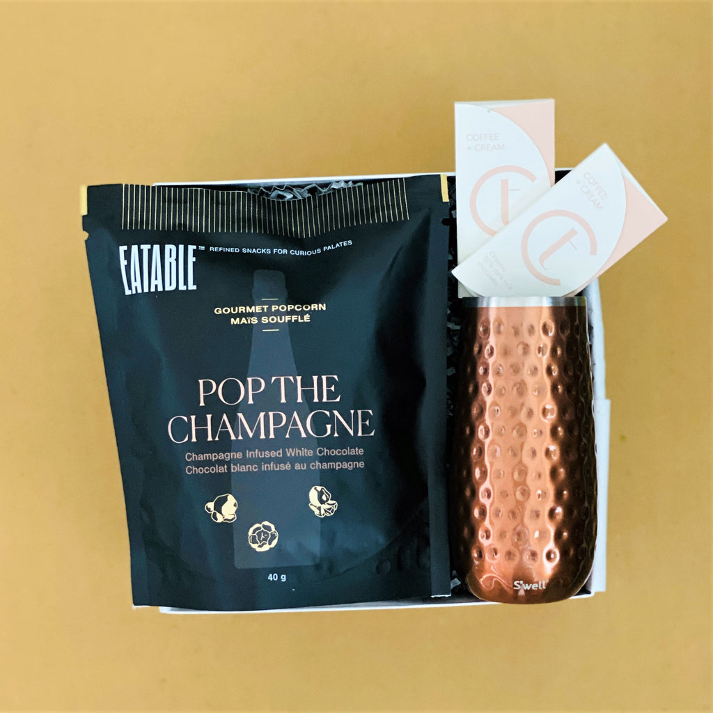 A champagne inspired gender neutral holiday gift box
